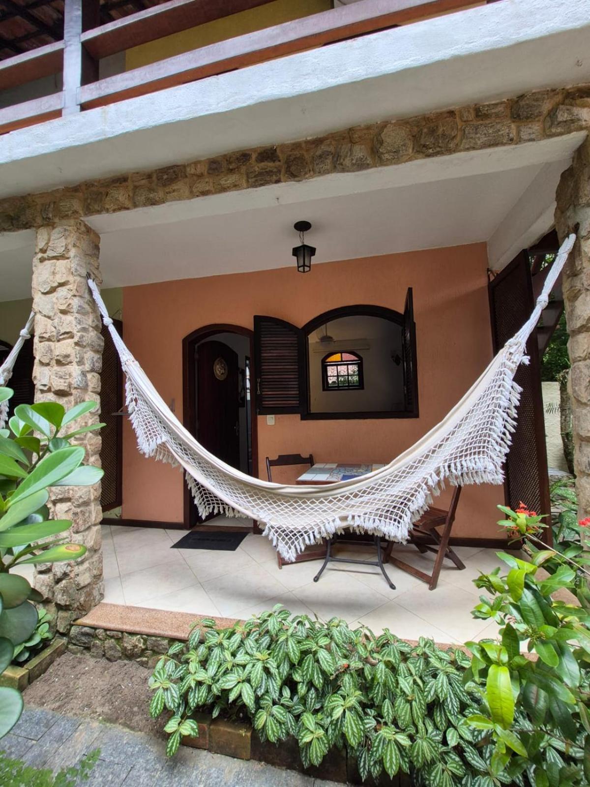 Suíte com Vista do Jardim